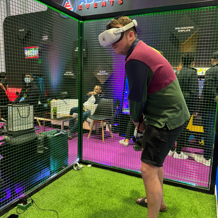 Adult person experiencing virtual reality adventure using modern VR headset